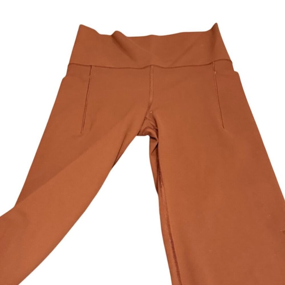 Athleta Burnt Orange Flare Leg Pants Size Small - Picture 10 of 11